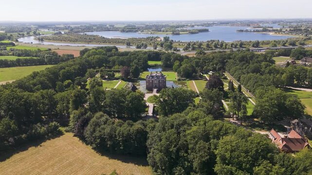 brick manor nestled within dense emerald forest winding river tributaries panorama blue lakes middachten castle netherlands revealing near aerial house gelderland de steeg 