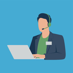 A man wearing a headset and working on a laptop in a professional setting.