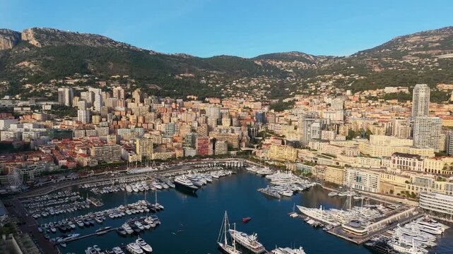 Sunset Harbor Scene, Luxurious Yachts By Sunset, Peaceful Marina With Hillside And City View. Monaco. Monte carlo