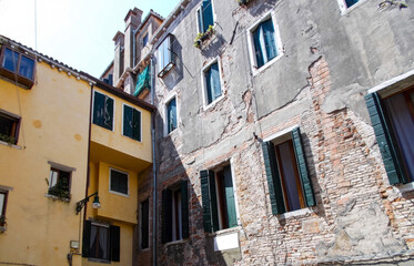 Charming narrow streets in Venice with colorful buildings and rustic walls
