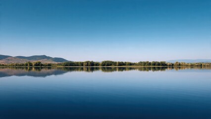 Peaceful Lake Landscape With Clear Blue Sky