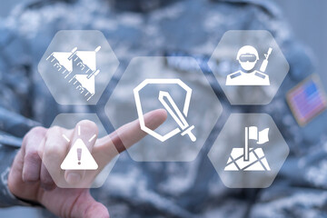 Naklejka premium Soldier using virtual touchscreen presses icon of shield with sword symbolizing: military weapons, defense, attack. Attack and Defense Military Modern Tactics Concept. Shield and sword as army symbol.