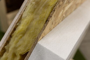 Wooden wall with thermal insulation