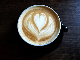 Closeup on Cappuccino Coffee Cup Froth Heart