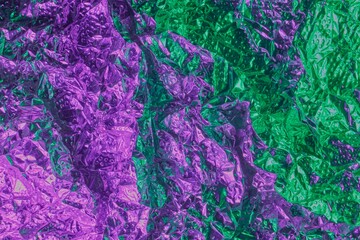 Vibrant Purple And Green Crumpled Foil Texture For Creative Design And Backgrounds