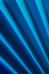 Obraz premium Abstraction of folded paper with dramatic shadows and bluish tones.