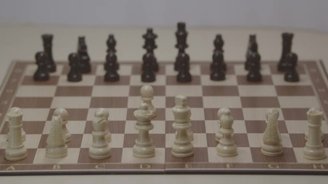 A cinematic shot of the first move in a chess game with White's pawn on d4. The concept of bold strategy and surprise in a chess game.