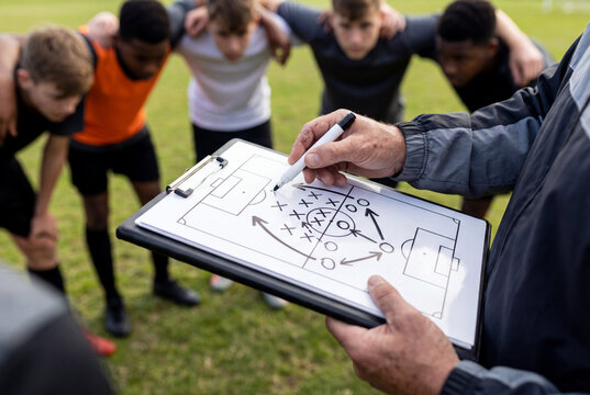 Hands, soccer team or coach planning a strategy with tactics or training formation on sports field. Board, fitness or closeup of manager teaching football players a game plan for match or workout