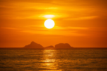 Sunset at Arpoador Beach in Rio de Janeiro.