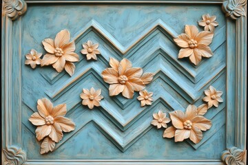 Ornate three dimensional floral decoration adorns a textured blue architectural panel