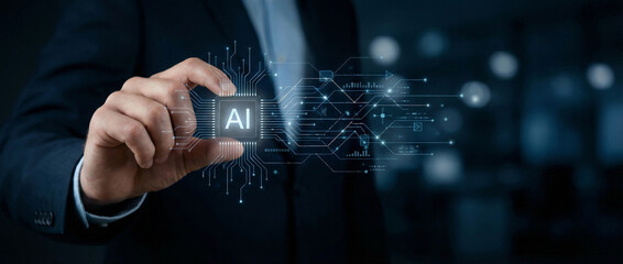 Businessman in a suit holding an AI microchip, symbolizing artificial intelligence and future technology development.