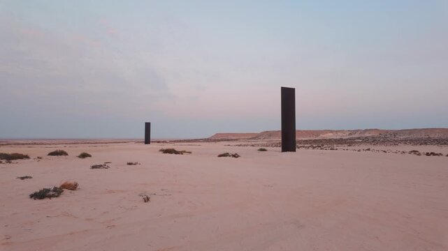 Steel Monuments a the desert safari in Zekreet, Qatar at the sunset time