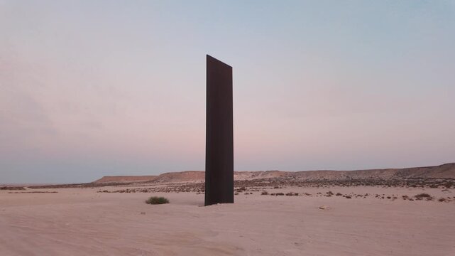 Steel Monuments a the desert safari in Zekreet, Qatar at the sunset time