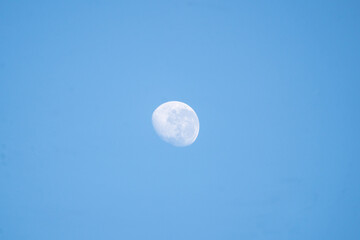 moon over the blue sky