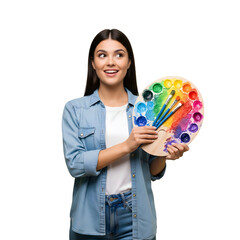 Fototapeta premium A young woman is holding a colorful palette and brushes, wearing a blue shirt, looking away, likely an artist, isolated on transparent background
