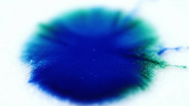 Delicate Halo Formation Extreme macro focus on the initial diffusion and the subtle backrun halo emerging at the edges of the ink bloom.