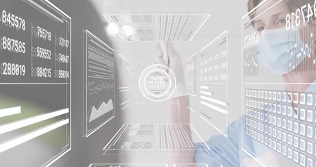 Reaching masked clinician in clinic blue scrubs and scrub cap, touching HUD with glove, copy space