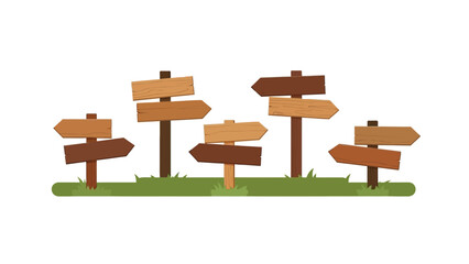 Obraz premium Multiple wooden directional signposts on grassy field.