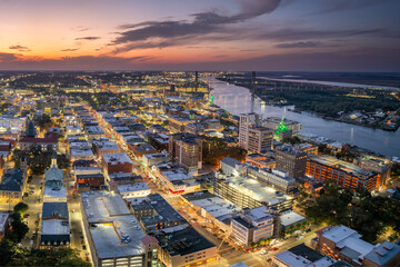 Savannah, Georgia. Waterfront American architecture with illuminated streets and historical buildings