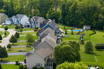 Residential homes in suburban sprawl development in Rochester, New York. Low-density two story private houses in rural suburbs. Housing market in the USA