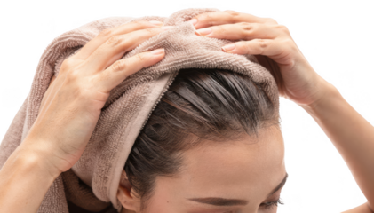 Person gently toweldrying hair with soft fabric focusing on scalp care isolated on white background for a natural drying method concept.