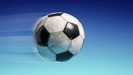 Naklejka premium Floating soccer ball against clear sky