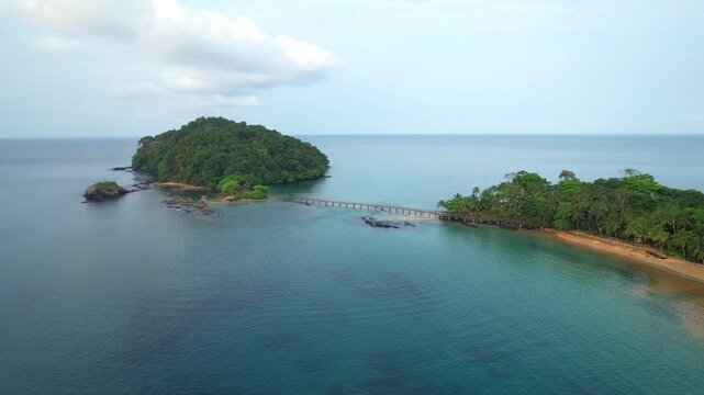 Aerial view towards bridge that connect Bom Bom islet at Bom bom beach. Ilha do Principe, Sao Tome,Africa