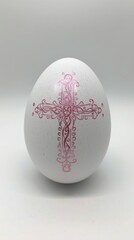 Decorated easter egg with pink cross design