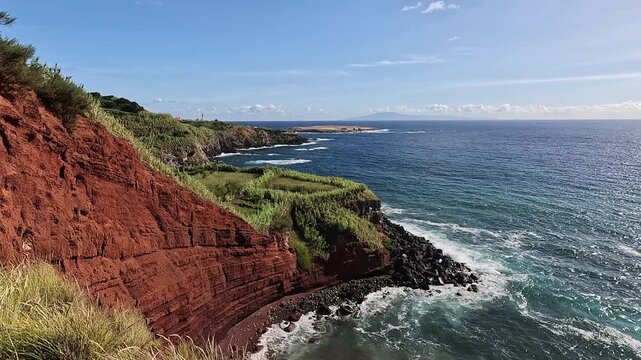 Red volcanic cliffs at Praia de Argila do Topo on Sao Jorge Island, Azores, Portugal