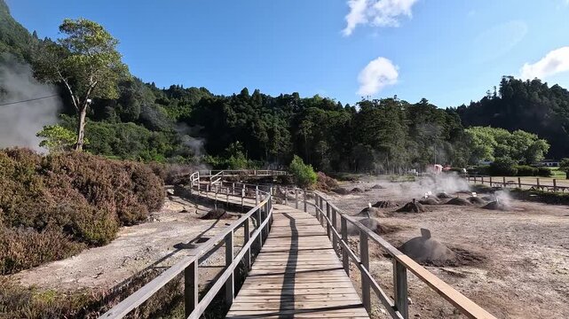 Steaming geothermal fumaroles at Lagoa das Furnas, located inside the Furnas volcanic caldera on Sao Miguel Island, Azores, Portugal