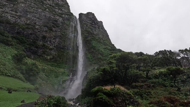 Close-up of water cascading down basalt cliffs, Cascata do Poco do Bacalhau, Faj&Atilde;&pound; Grande, Flores Island, Azores, Portugal