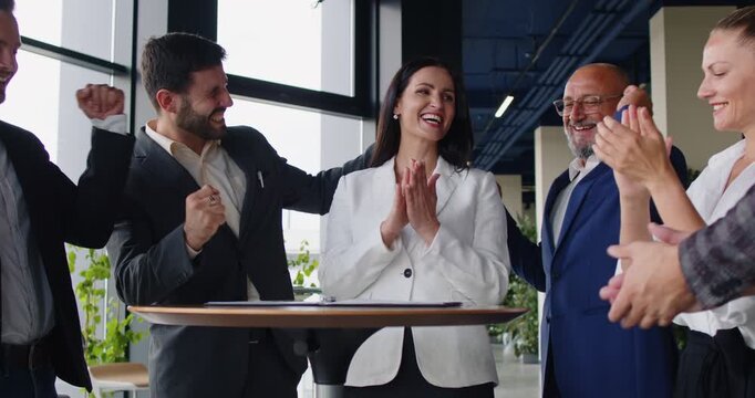 Colleagues applaud success achievement and business victory of female leader on office meeting. People celebrate proud win and leadership with applause, motivation gestures of power and unity