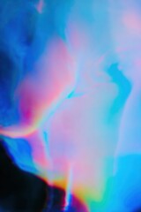 Abstract liquid texture with turquoise and pink swirls creating a dreamy marble effect for artistic backgrounds and creative design projects with copy space