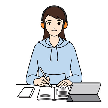 聴覚過敏用イヤーマフを使用して真剣に勉強に取り組む女性