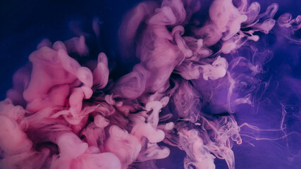 Ink water. Neon splash. Blur purple lilac color paint fluid wet vapor smoke liquid swirling on abstract dark black foggy background.