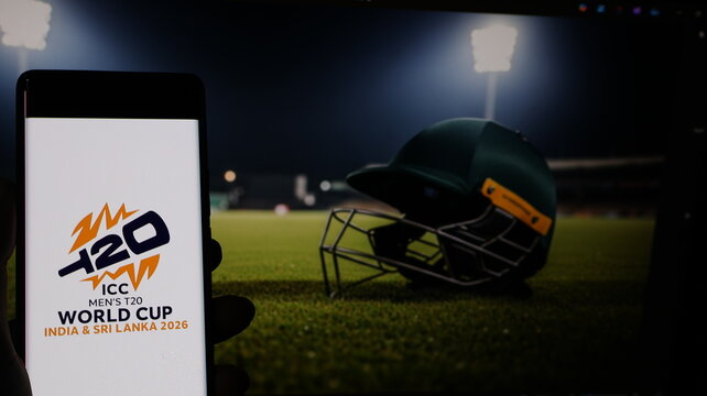 New Delhi, India - January 19 2026: T20 World Cup 2026 Logo on Phone Screen with Cricket Helmet