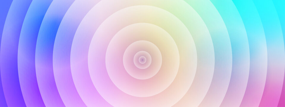 Multi colored circular ripples expanding outward with soft pastel tones