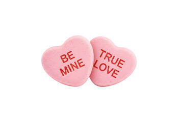 Two pink candy hearts for Valentine's Day, isolated on a white background
