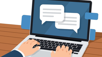 Close-up of hands typing on a laptop with chat bubbles on the screen against a wooden desk and white background.