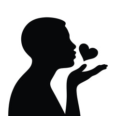 Silhouette of a person blowing a kiss with a heart
