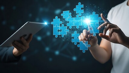Person holding tablet and touching digital puzzle pieces with glowing connections hands