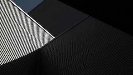 Futuristic metallic background with black and silver panels