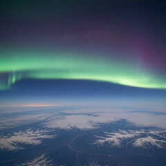 aurora borealis on snowy landscape
