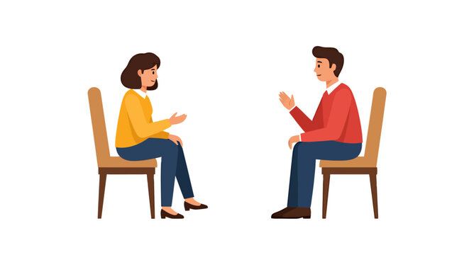 Two people sitting on chairs and talking facing each other in a professional discussion or counseling session