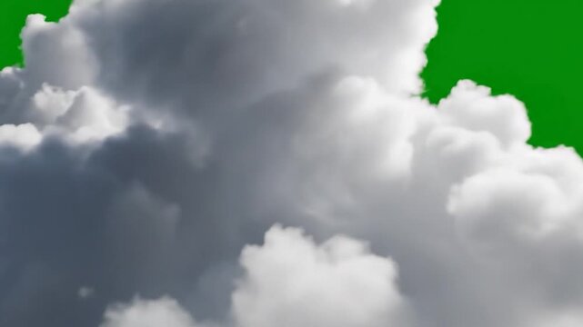 Fluffy white clouds with gray undertones on a vibrant green background