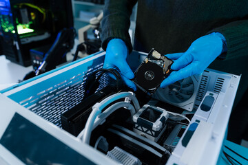 Hands repairing electronic devices. Electronic technician.