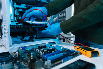 Hands repairing electronic devices. Electronic technician.