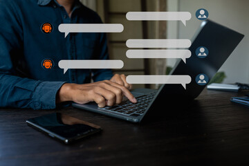 Businessman uses artificial intelligence chatbots automatically respond online messages to help customers instantly.