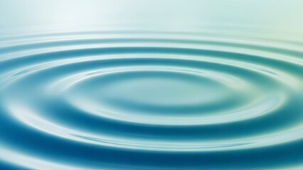 Rippling water radiates from the center creating concentric circles on a bluegreen surface