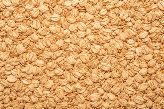 Tightly packed rolled oats texture background